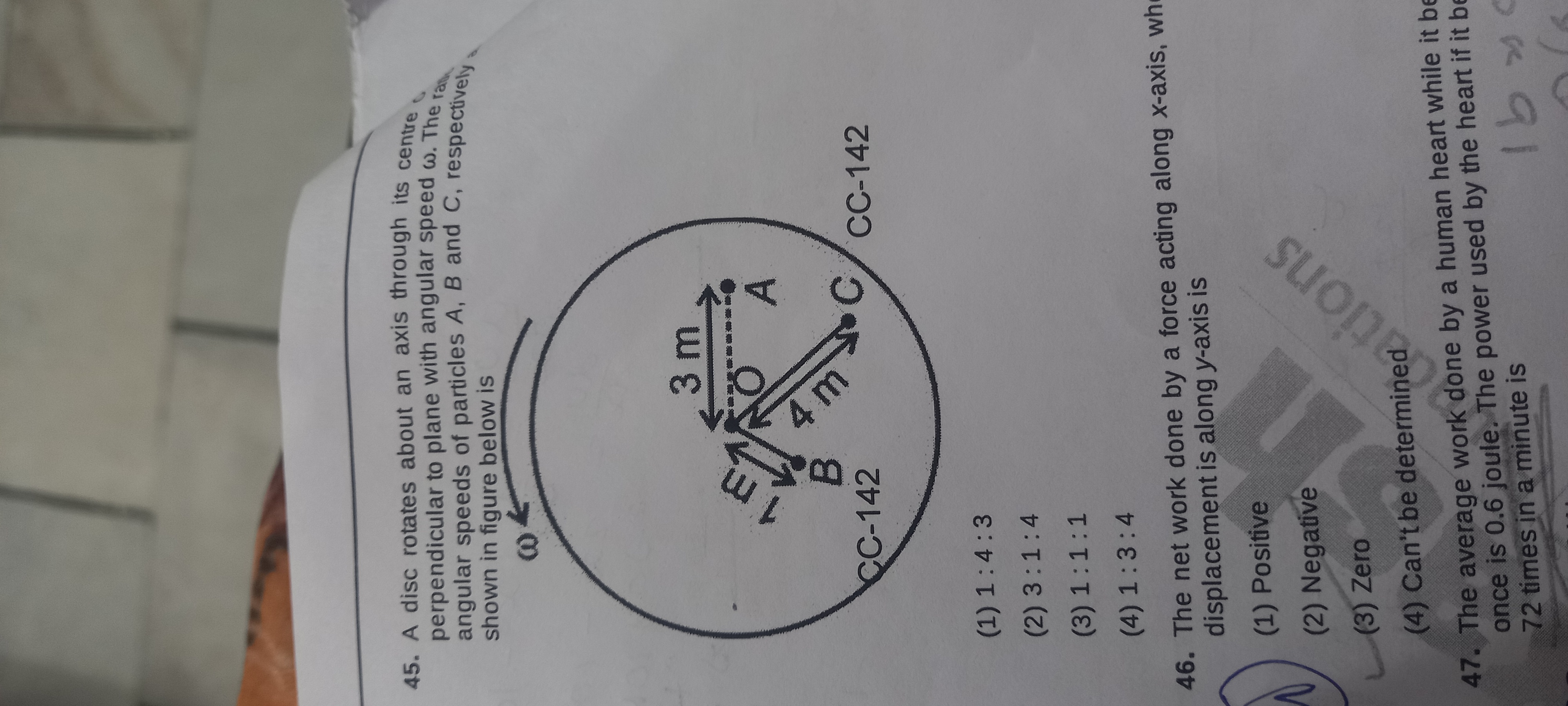 45. A disc rotates about an axis through its centre
perpendicular to p