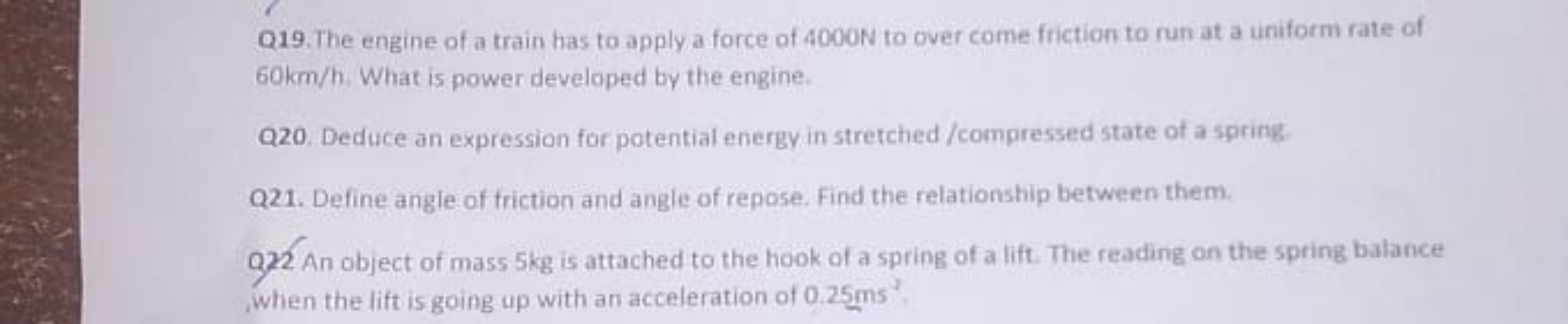 Q19. The engine of a train has to apply a force of 4000 N to over come