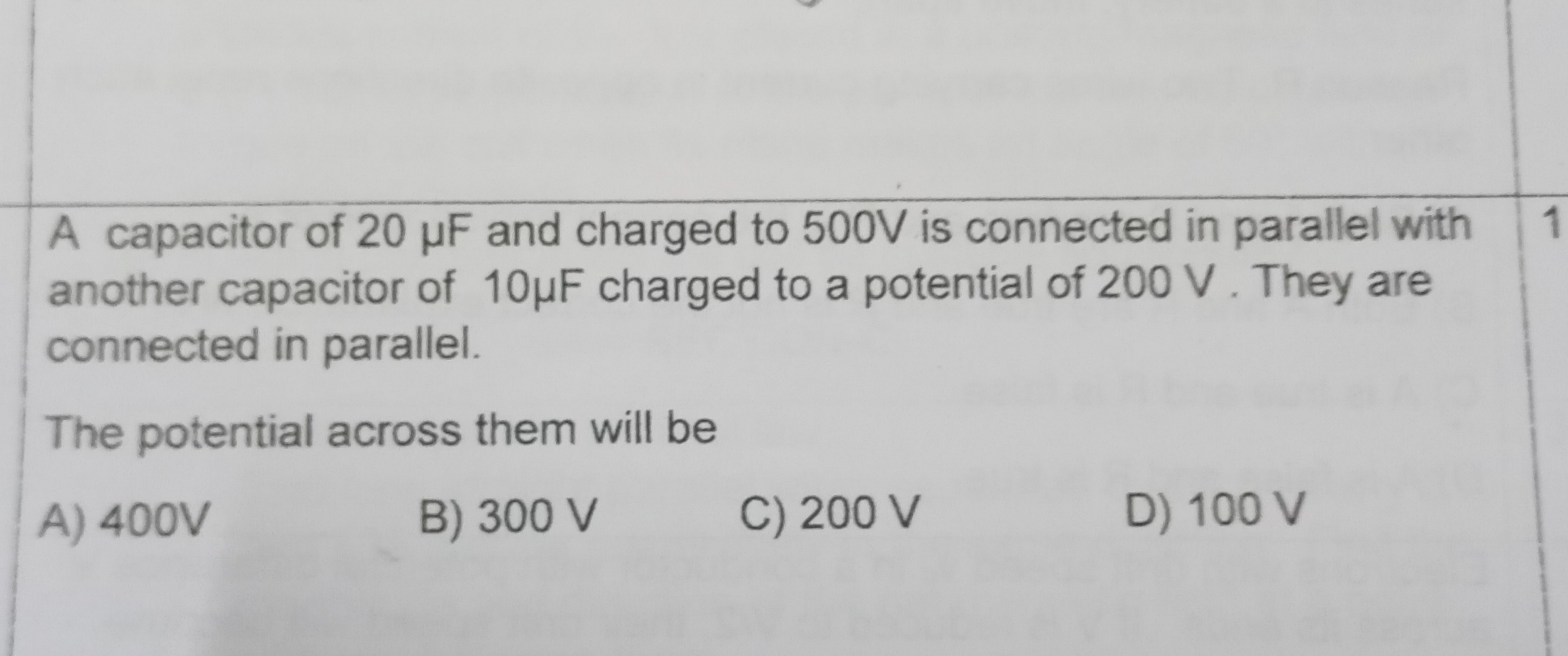 A capacitor of 20μ F and charged to 500 V is connected in parallel wit