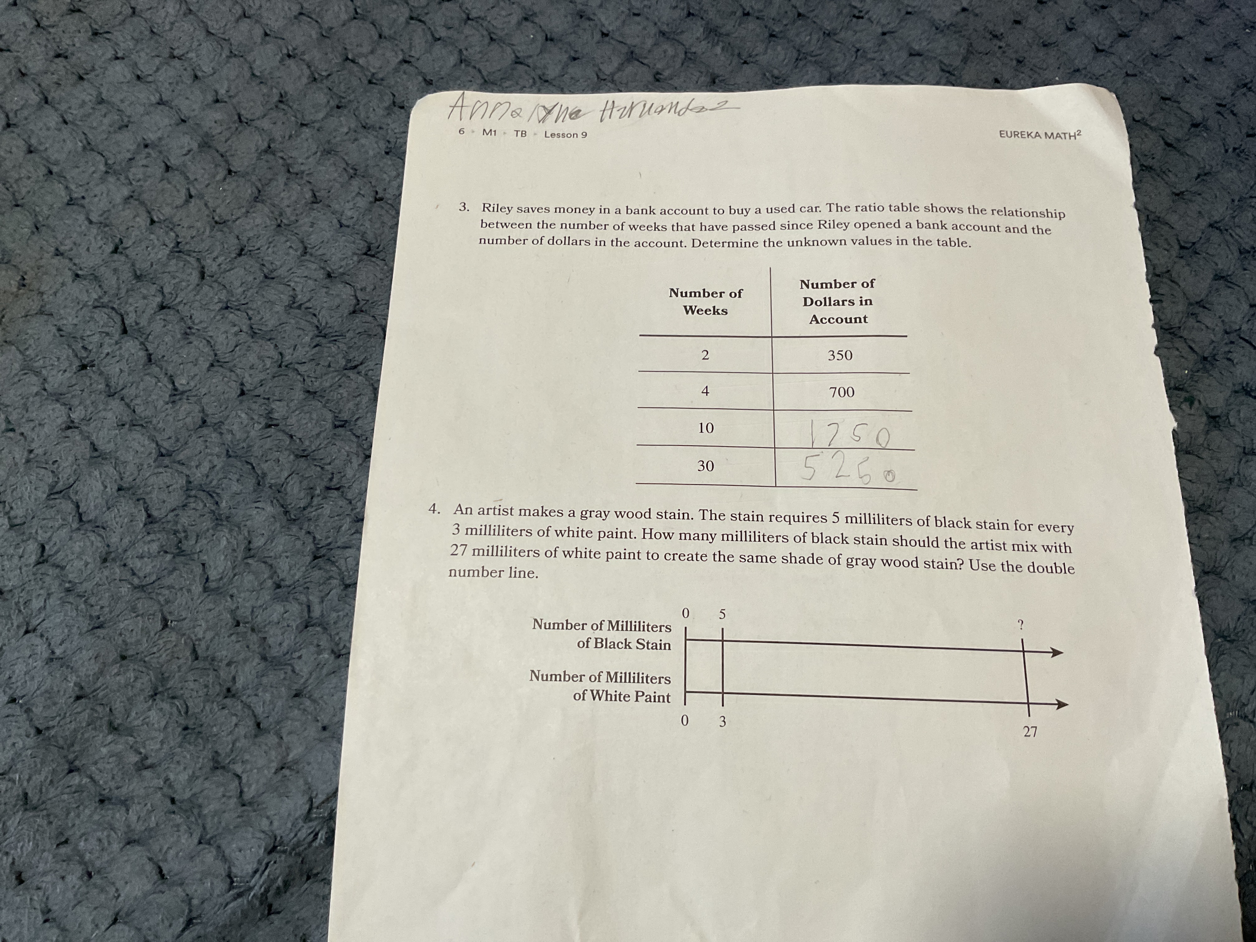 3. Riley saves money in a bank account to buy a used car. The ratio ta