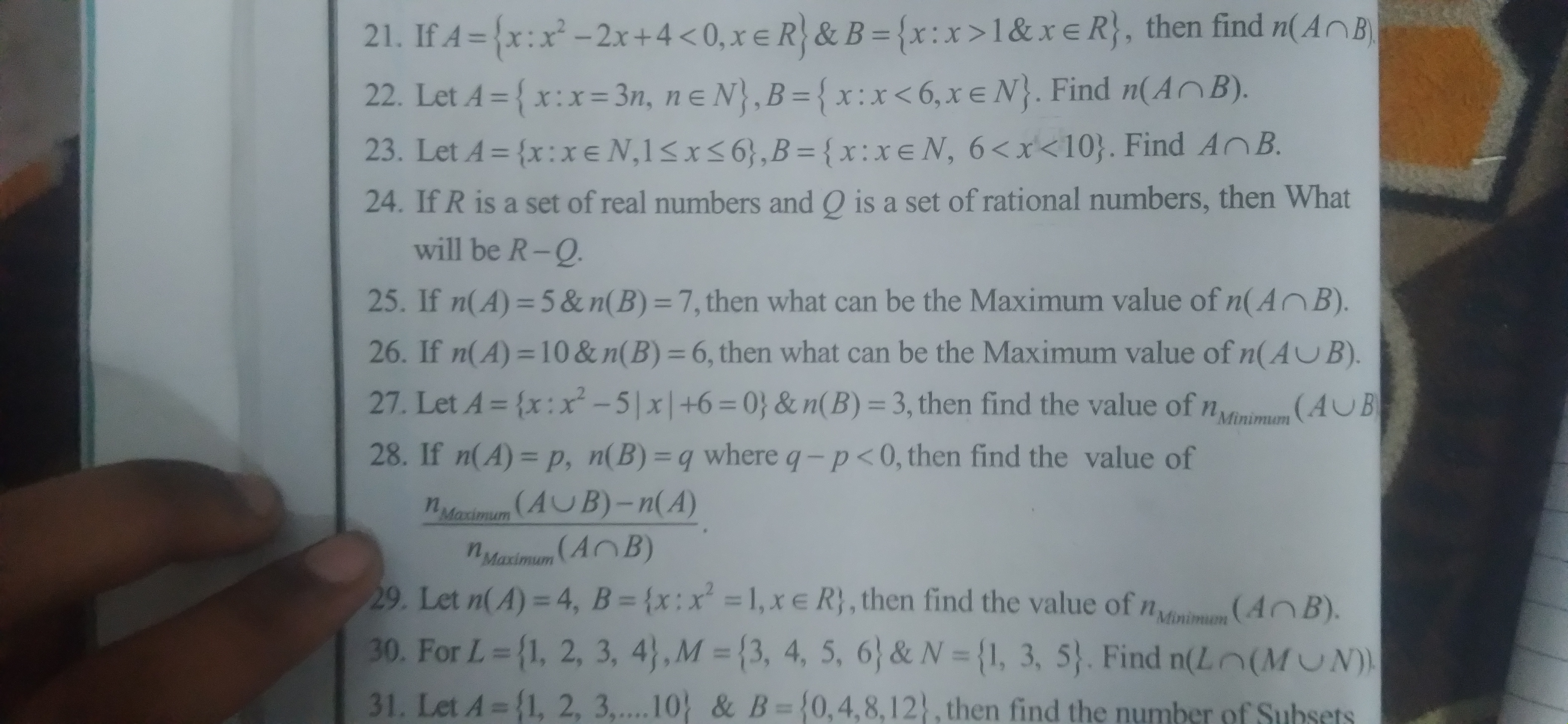 21.
If A= {x:x²-2x+41&xe R}, then find n(AB
22. Let A = {x:x=3n, ne N}