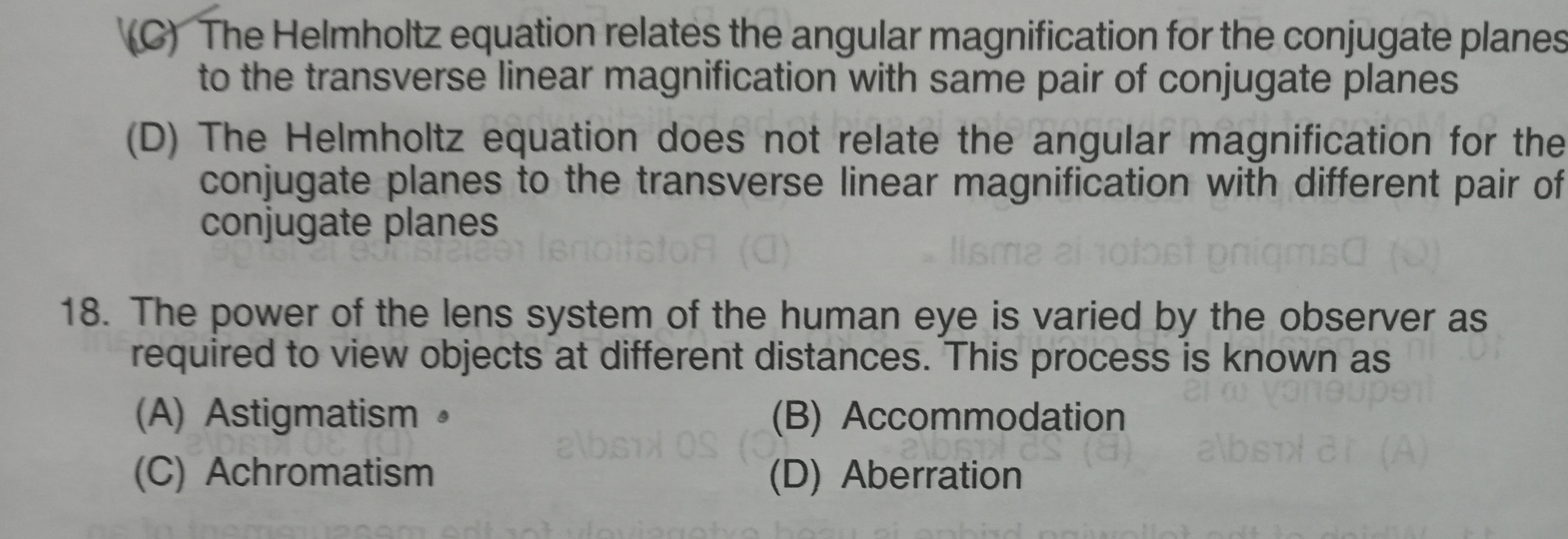 (C) The Helmholtz equation relates the angular magnification for the c