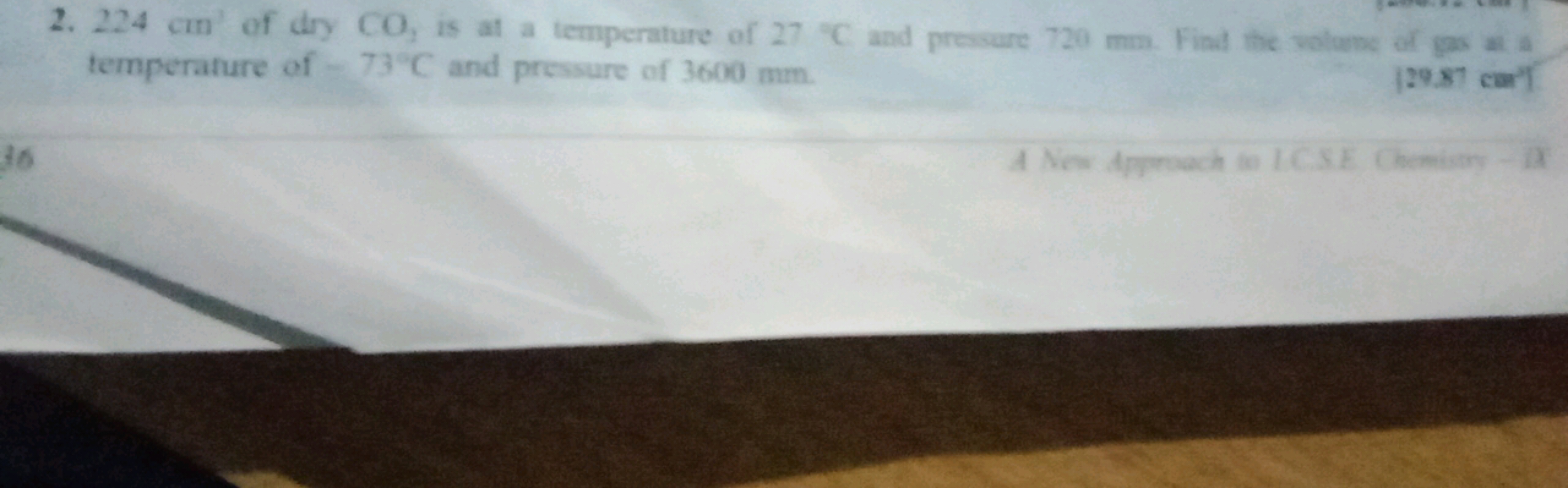 2. 224 cm′ of dry CO2​ is at a temperature of 27∘C and presure 720 mm 