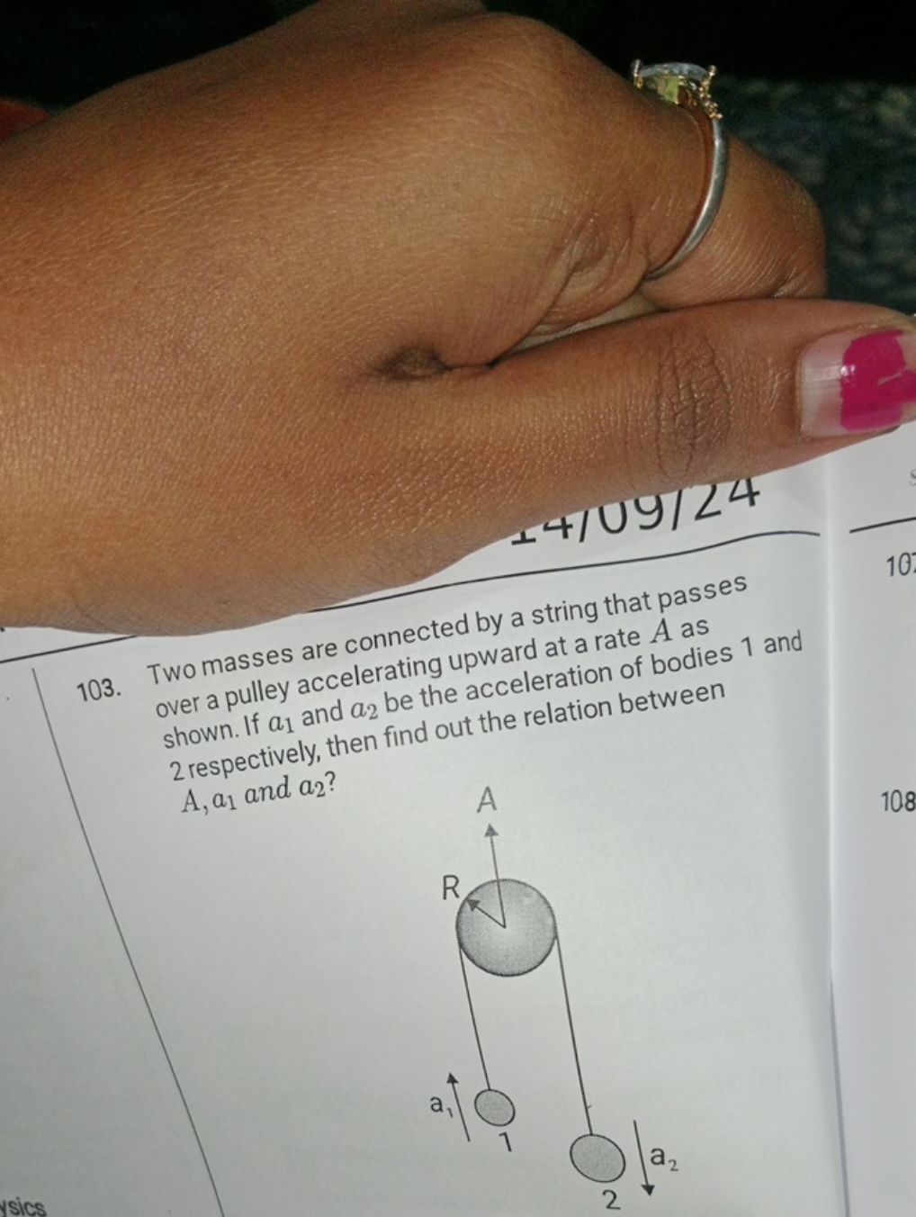 103. Two masses are connected by a string that passes over a pulley ac