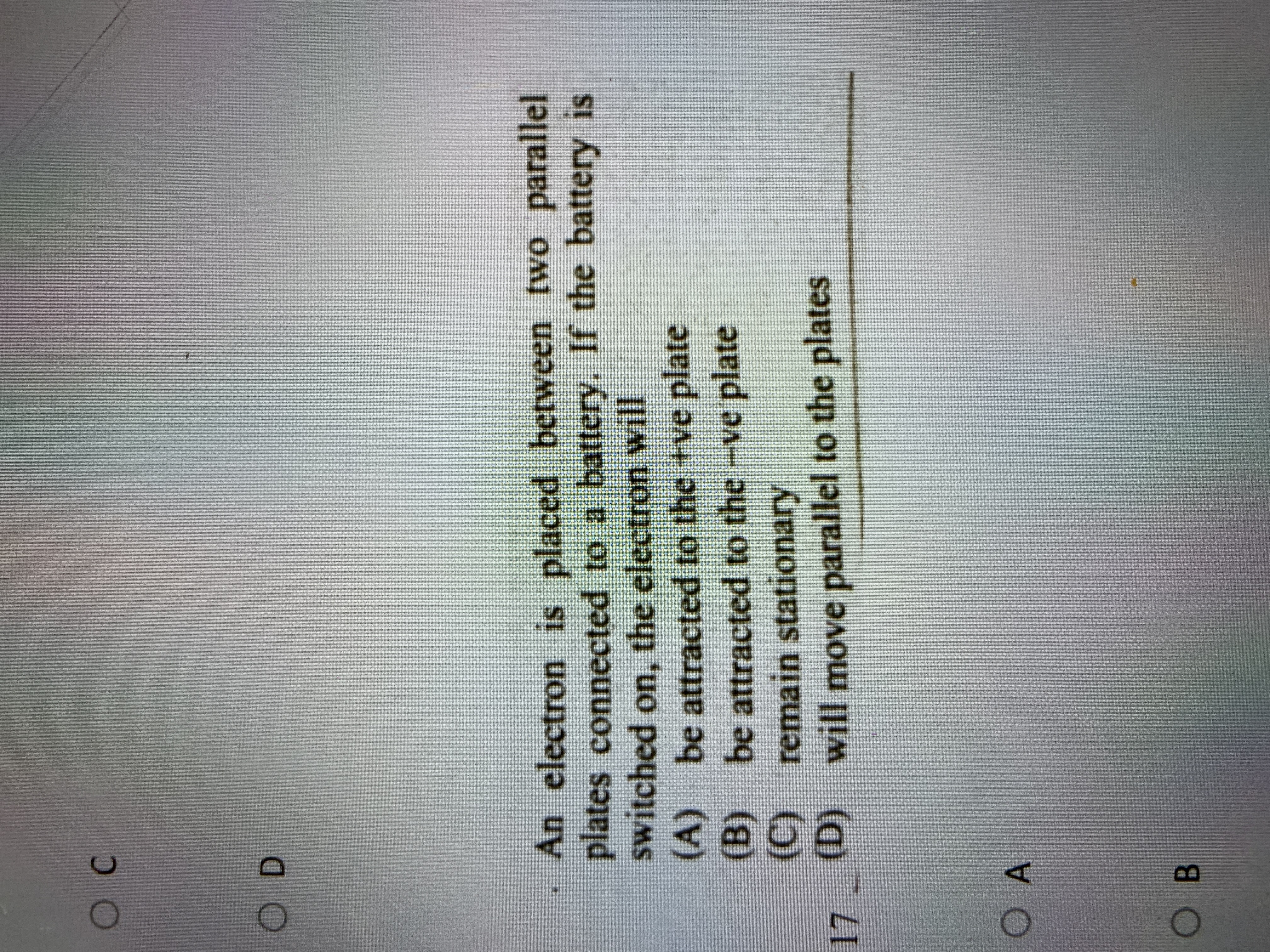 
C
D
- An electron is placed between two parallel plates connected to 