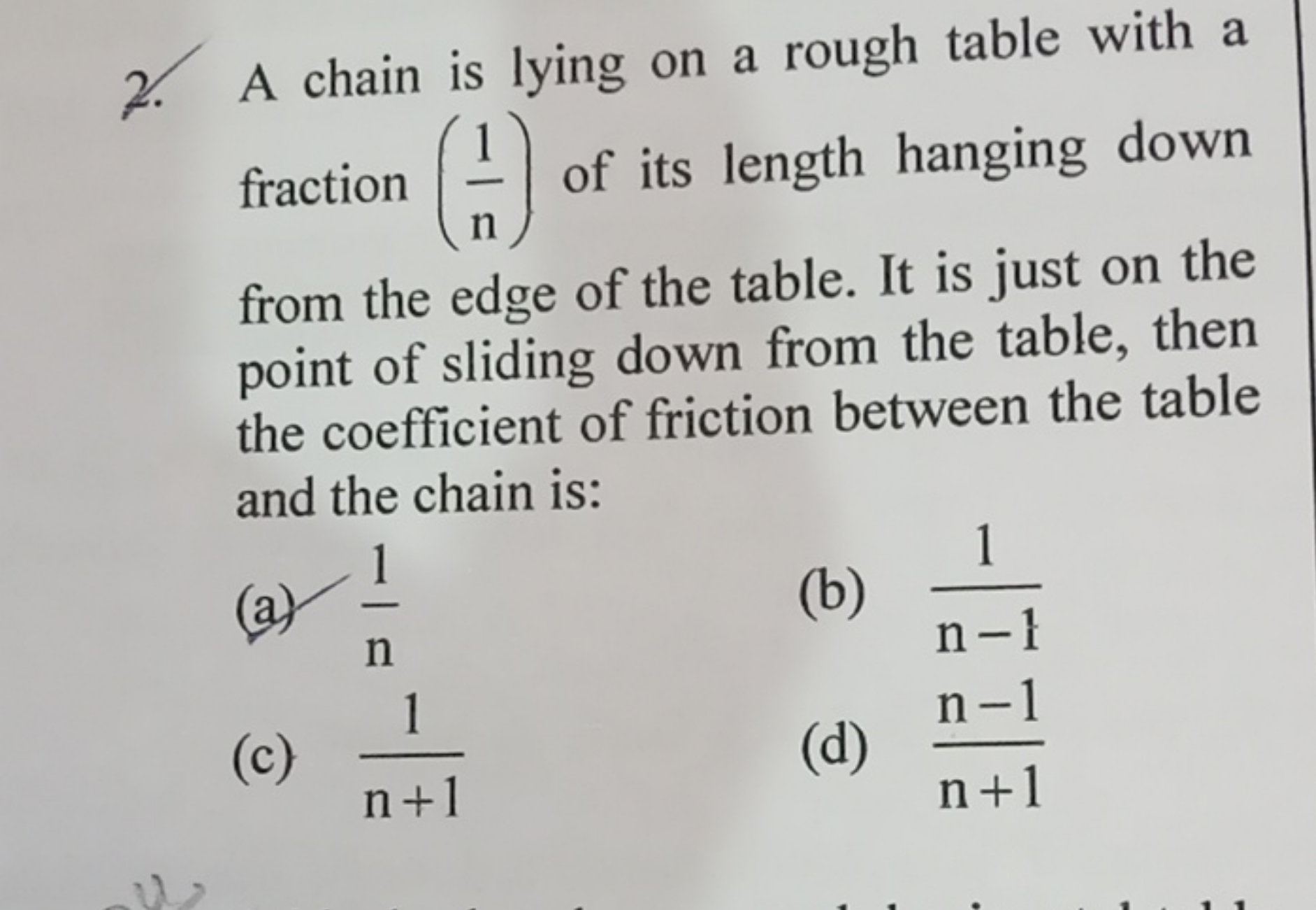 2. A chain is lying on a rough table with a from the edge of the table