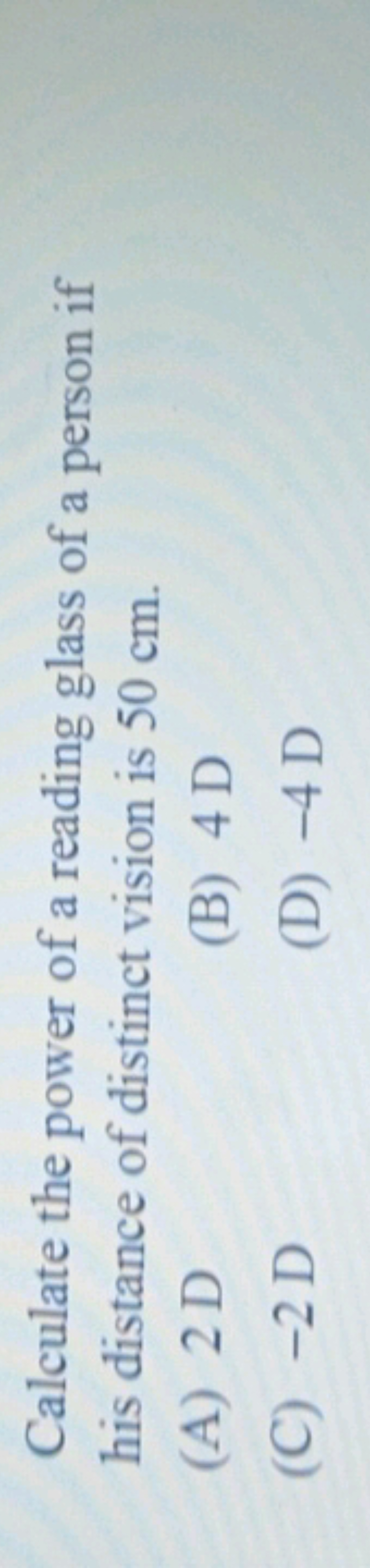 Calculate the power of a reading glass of a person if his distance of 