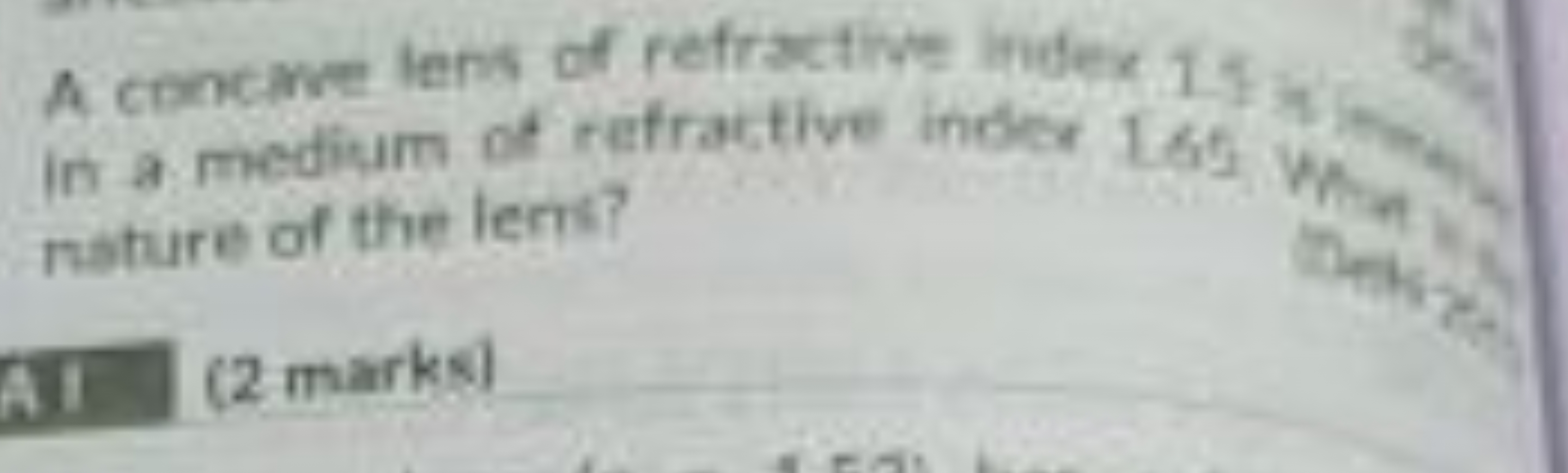 A concme lens of refractive index 1 I in a medium ot refrative inelict