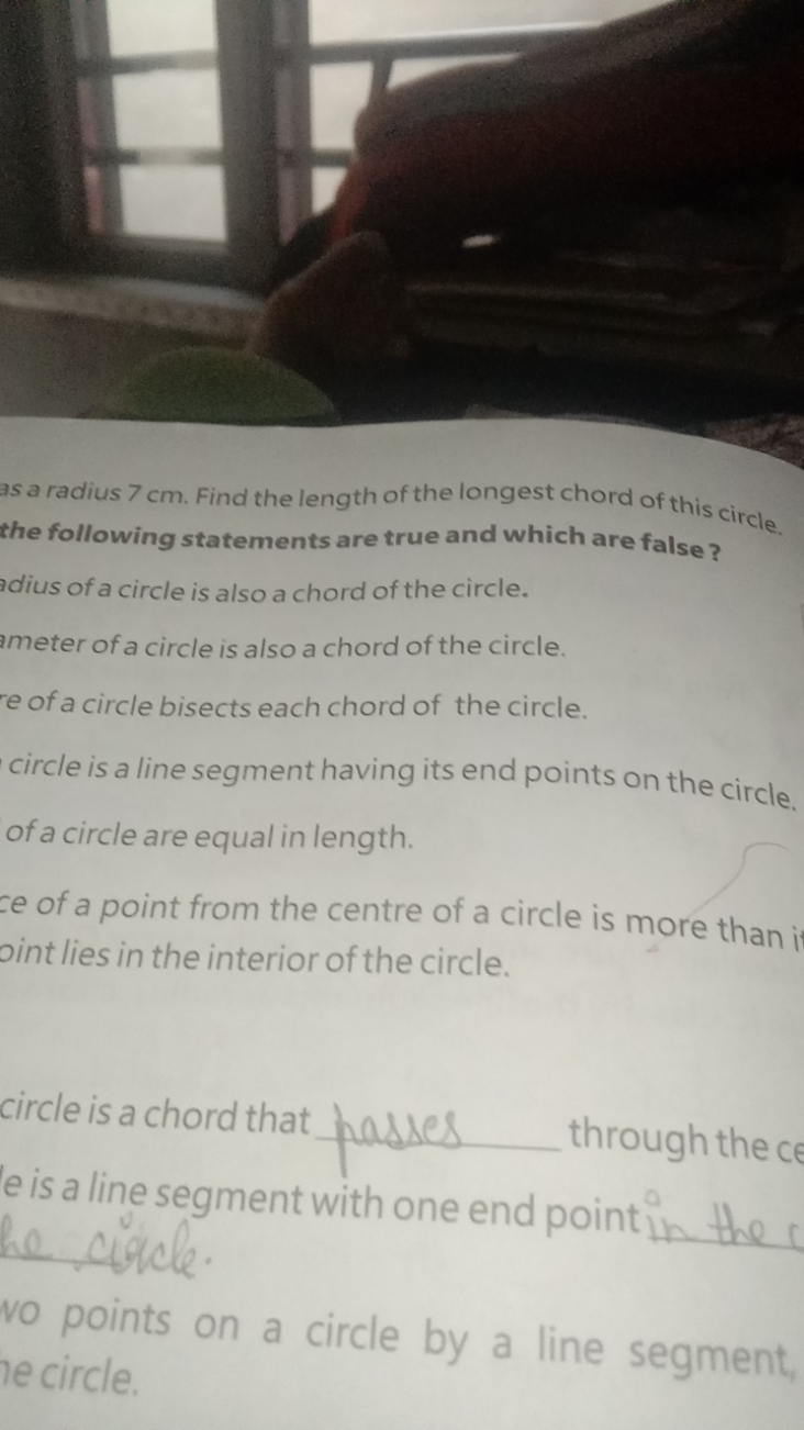 as a radius 7 cm . Find the length of the longest chord of this circle