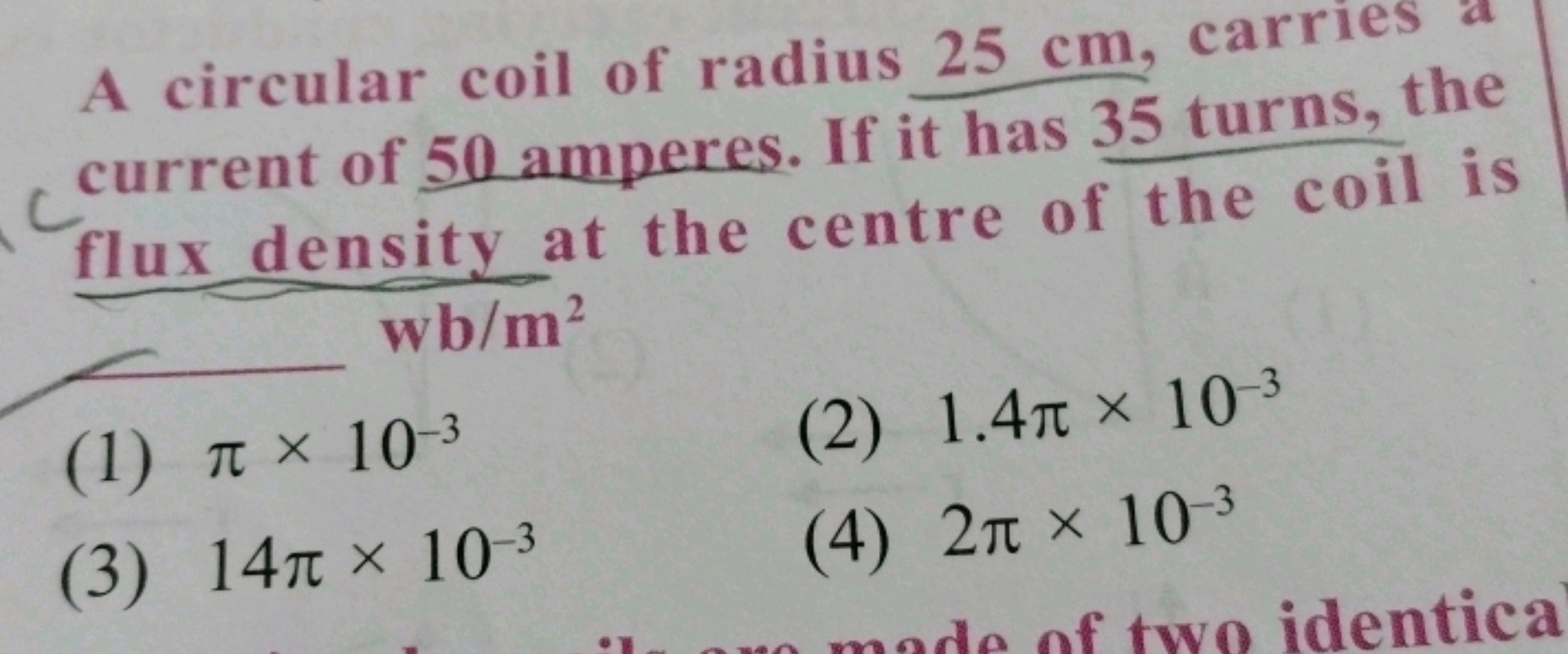 A circular coil of radius 25 cm , carries a current of 50 amperes. If 