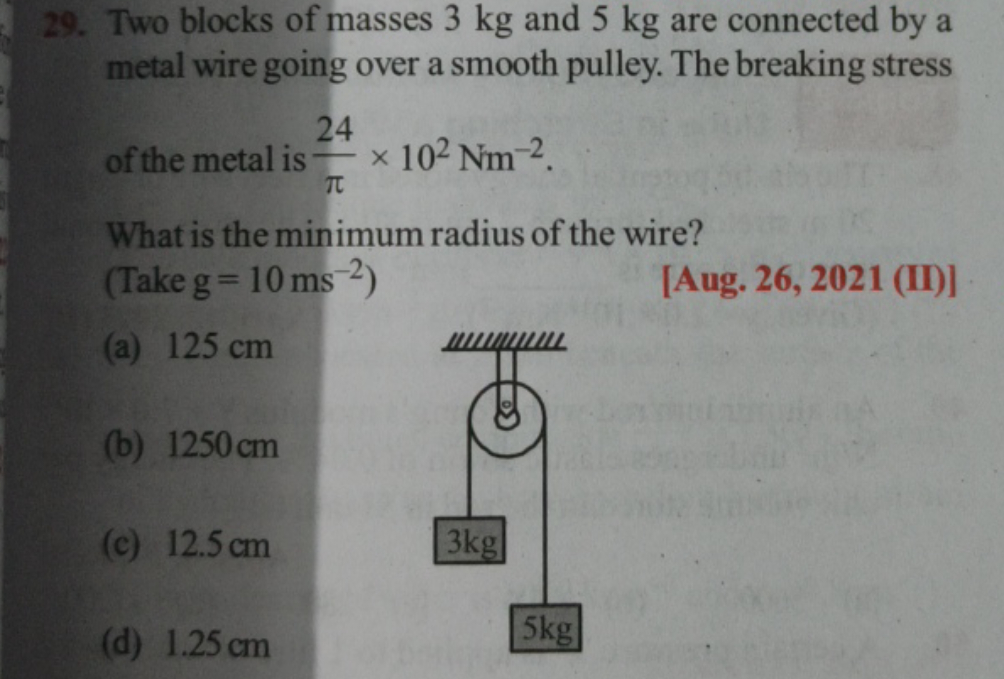 29. Two blocks of masses 3 kg and 5 kg are connected by a metal wire g