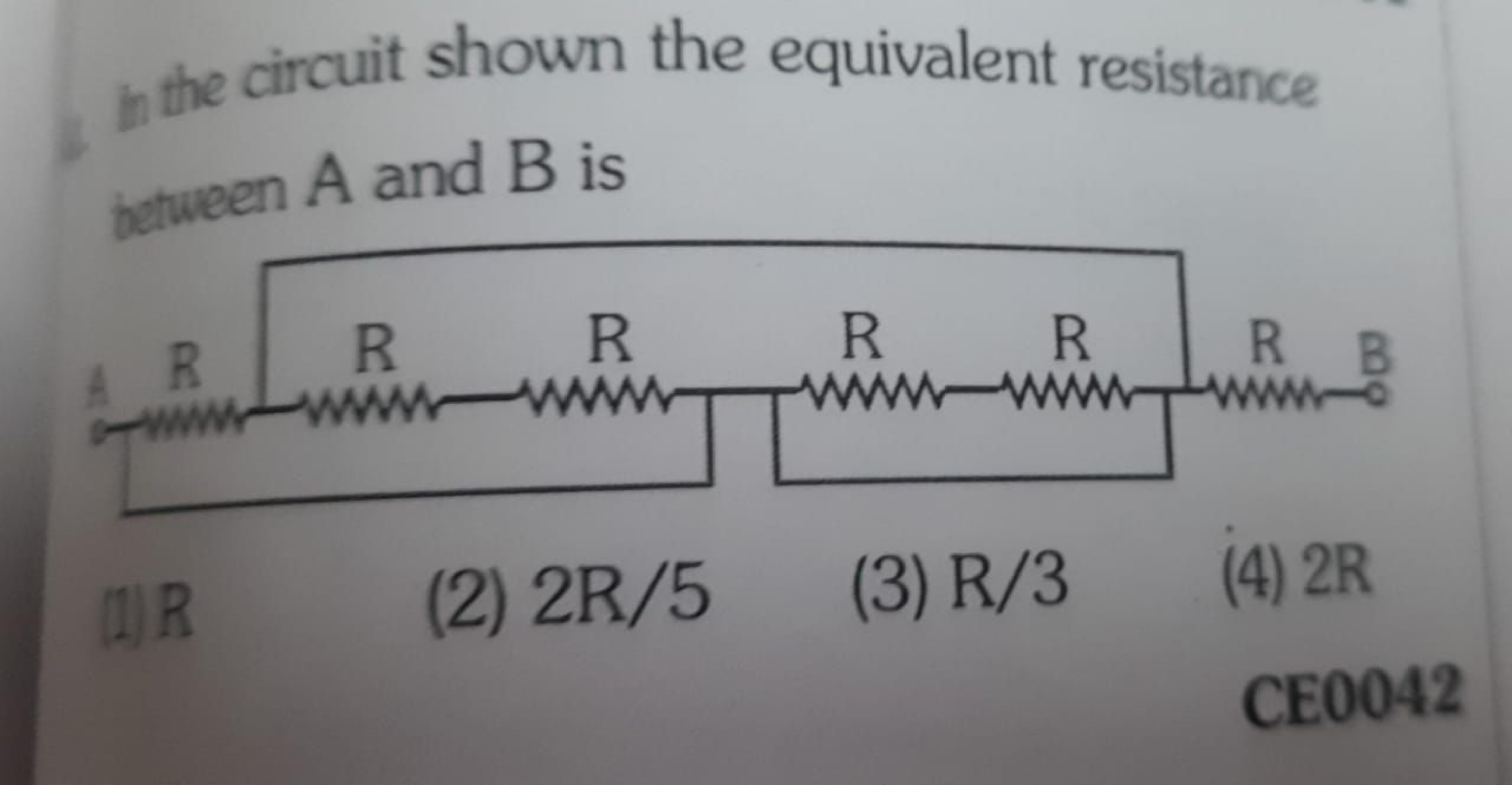 In the circuit shown the equivalent resistance between A and B is
(1) 