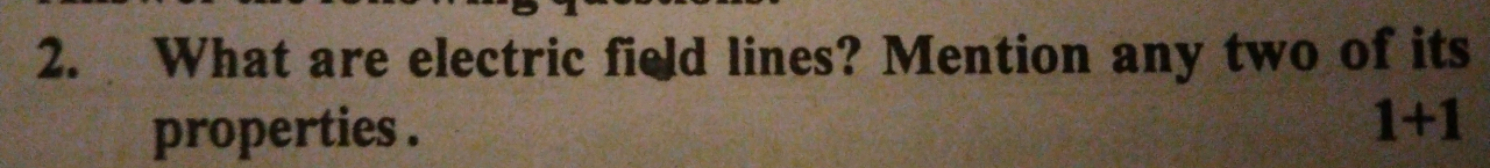 2. What are electric field lines? Mention any two of its properties.
1