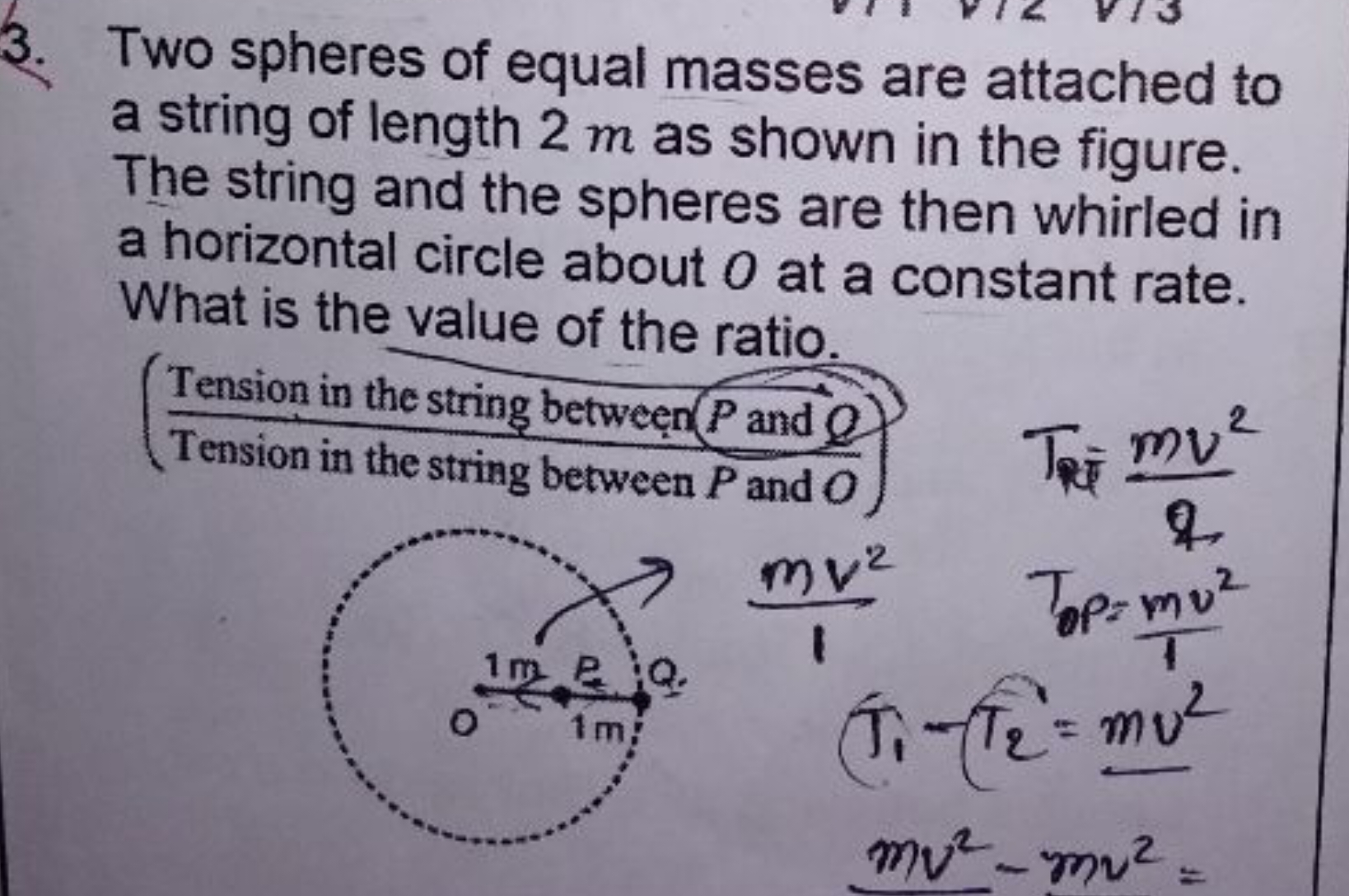 3. Two spheres of equal masses are attached to a string of length 2 m 