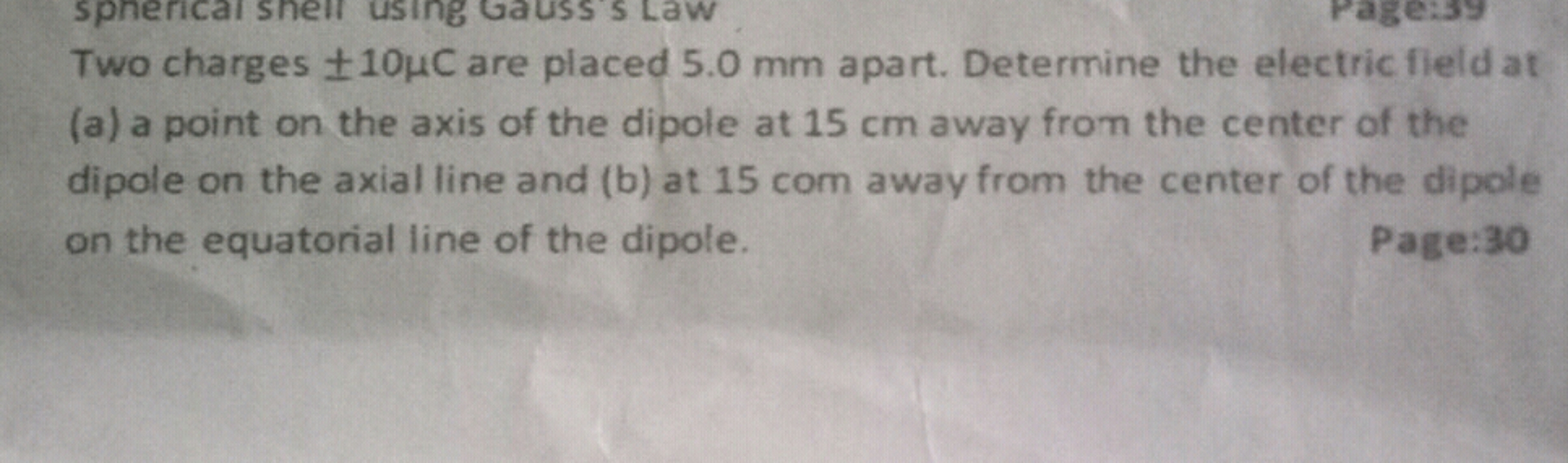 Two charges ±10μC are placed 5.0 mm apart. Determine the electric fiel