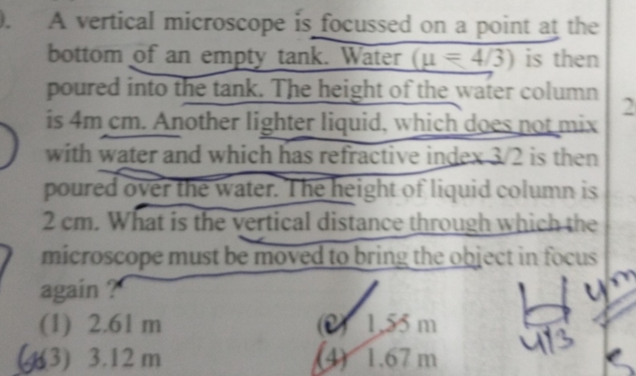 A vertical microscope is focussed on a point at the bottom of an empty