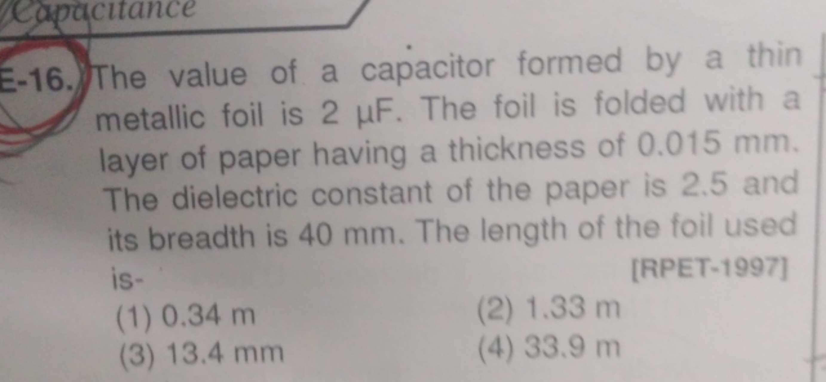 E-16. The value of a capacitor formed by a thin metallic foil is 2μF. 