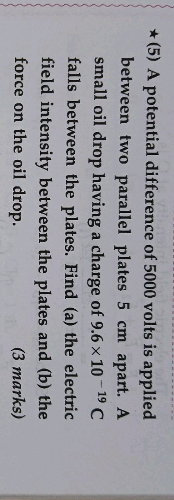 ⋆ (5) A potential difference of 5000 volts is applied between two para