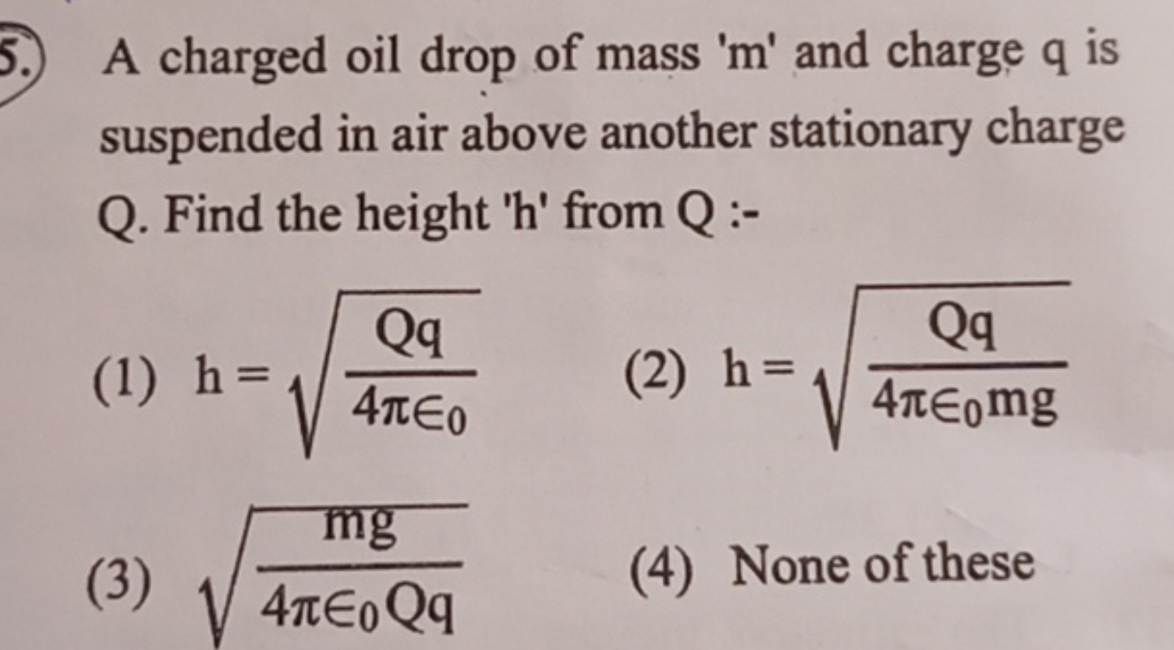 A charged oil drop of mass ' m ' and charge q is suspended in air abov