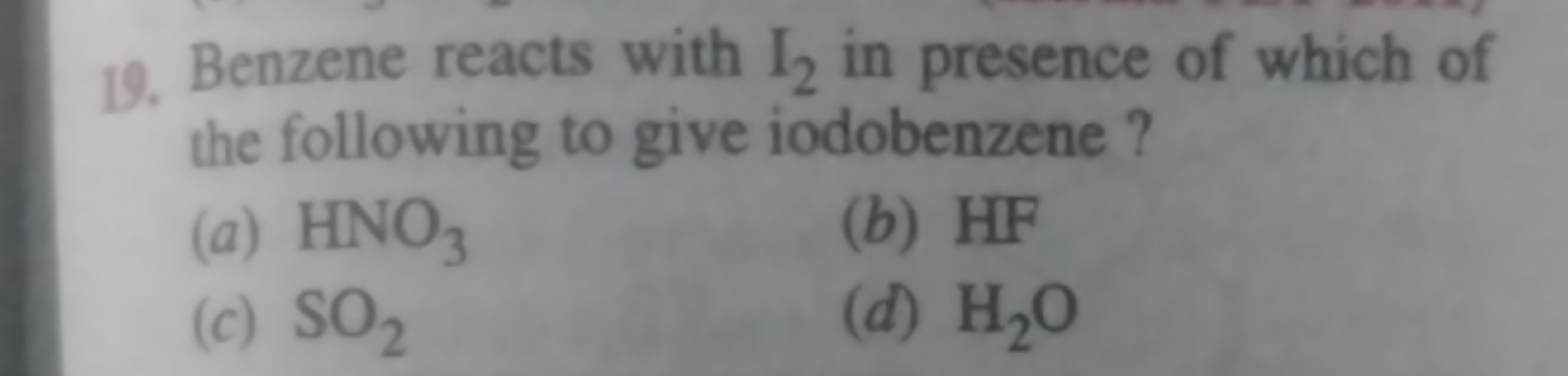 Benzene reacts with I2​ in presence of which of the following to give 