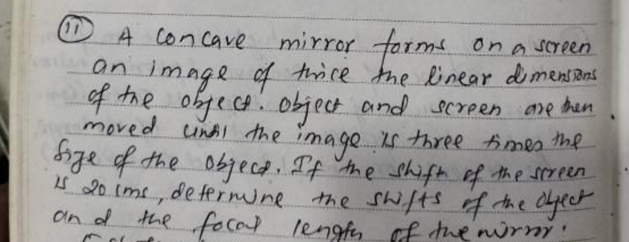 (11) A concave mirror forms on a screen an image of twice the linear d