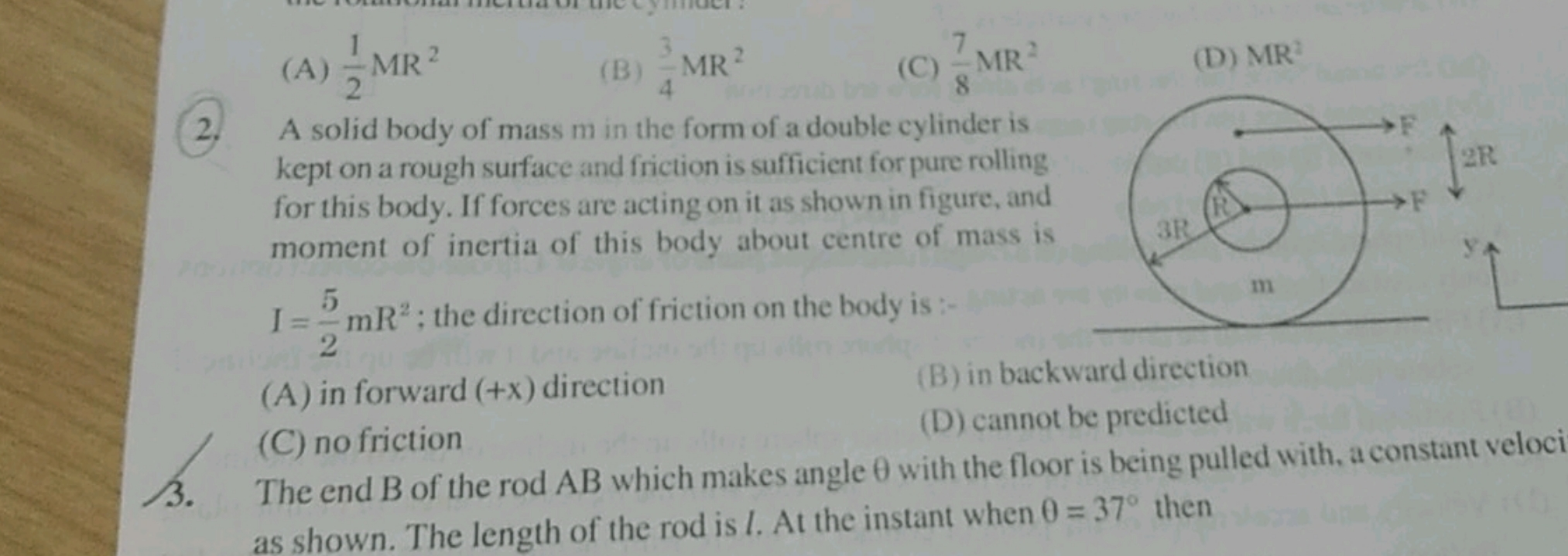 A solid body of mass m in the form of a double cylinder is kept on a r