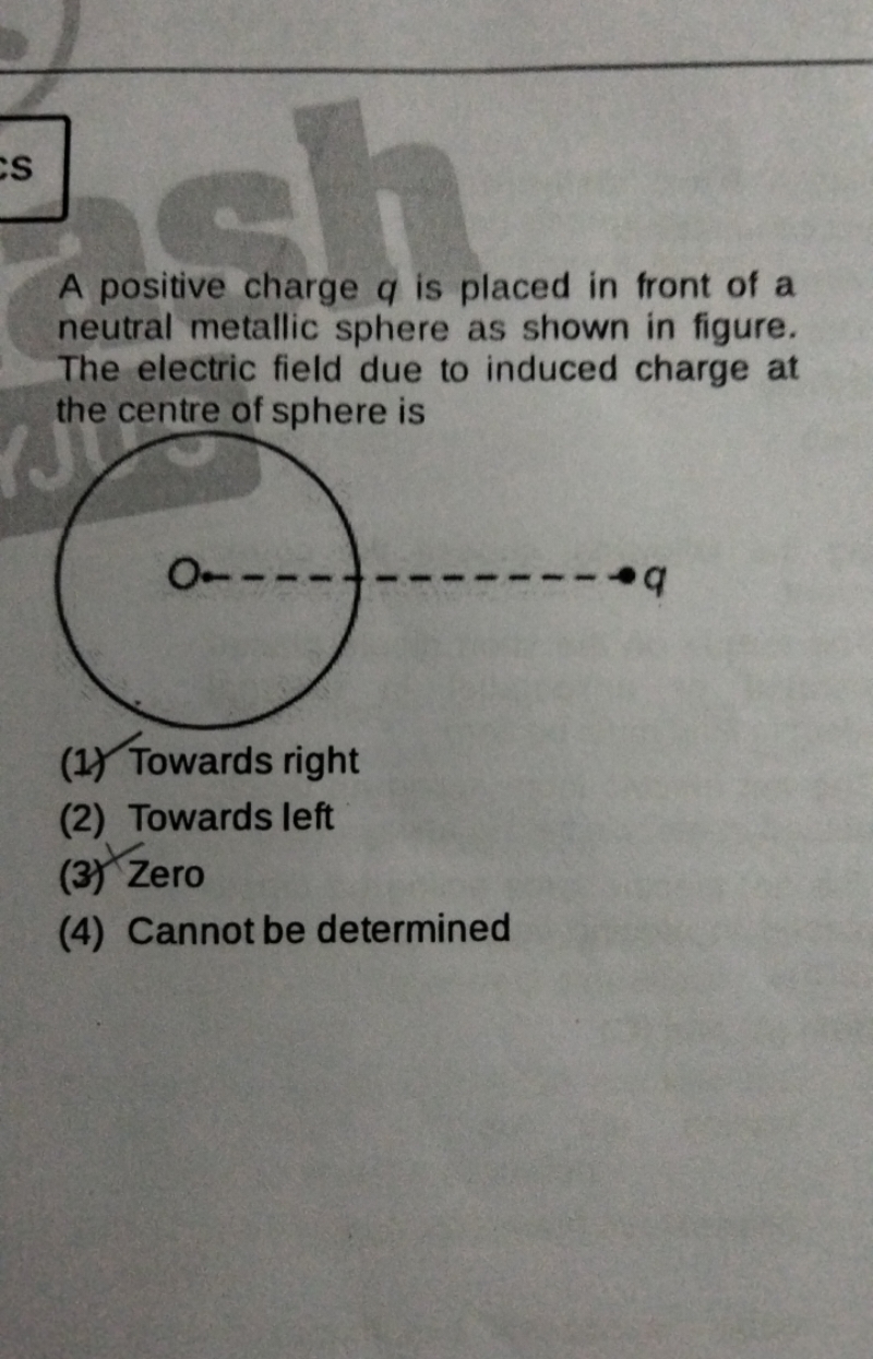 A positive charge q is placed in front of a neutral metallic sphere as