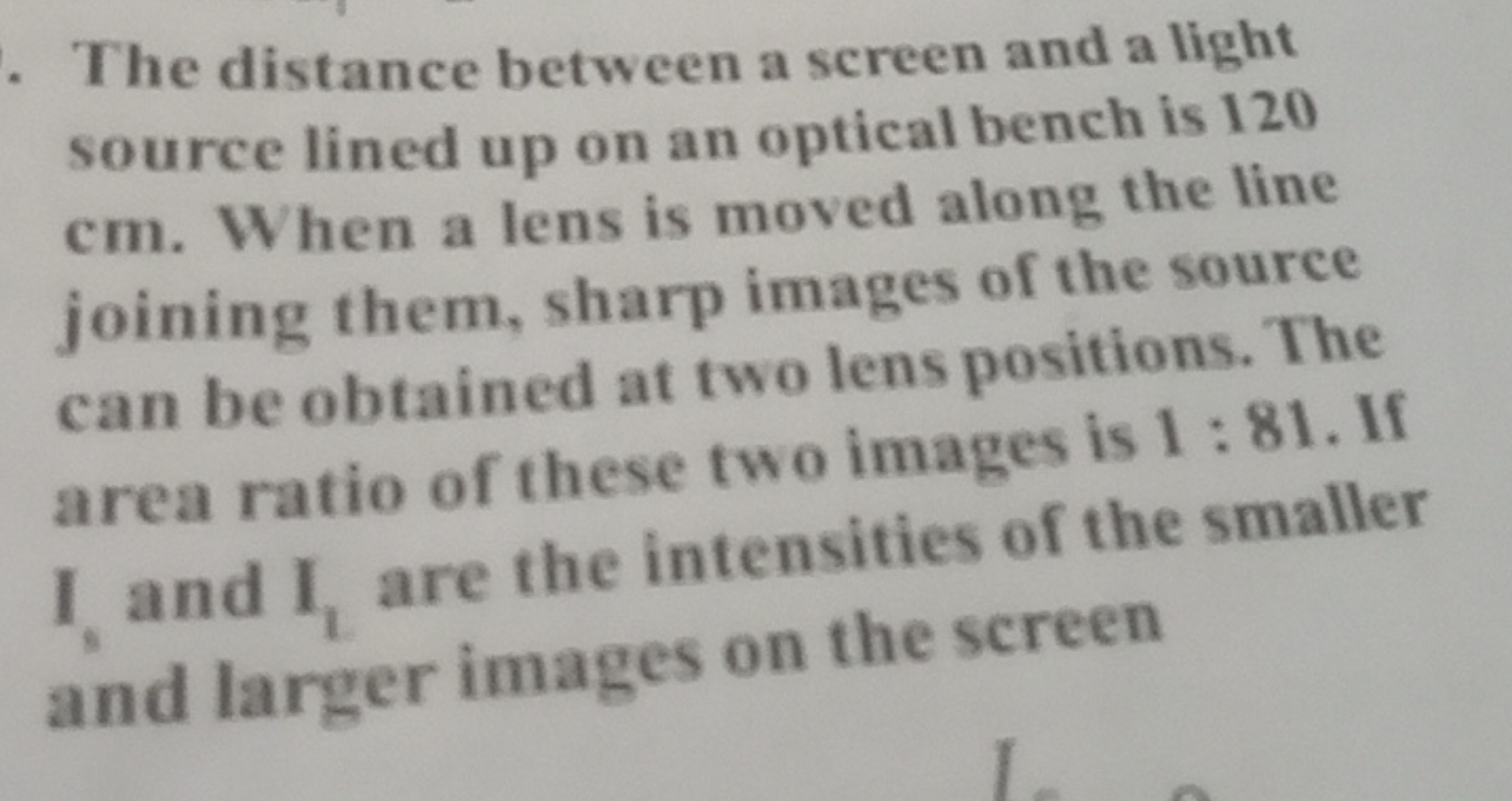 The distance between a screen and a light source lined up on an optica