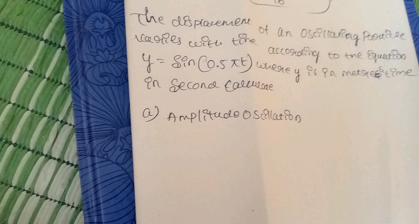 The disprarement varies with time an oscilcating porticle y=sin(0.5πt)