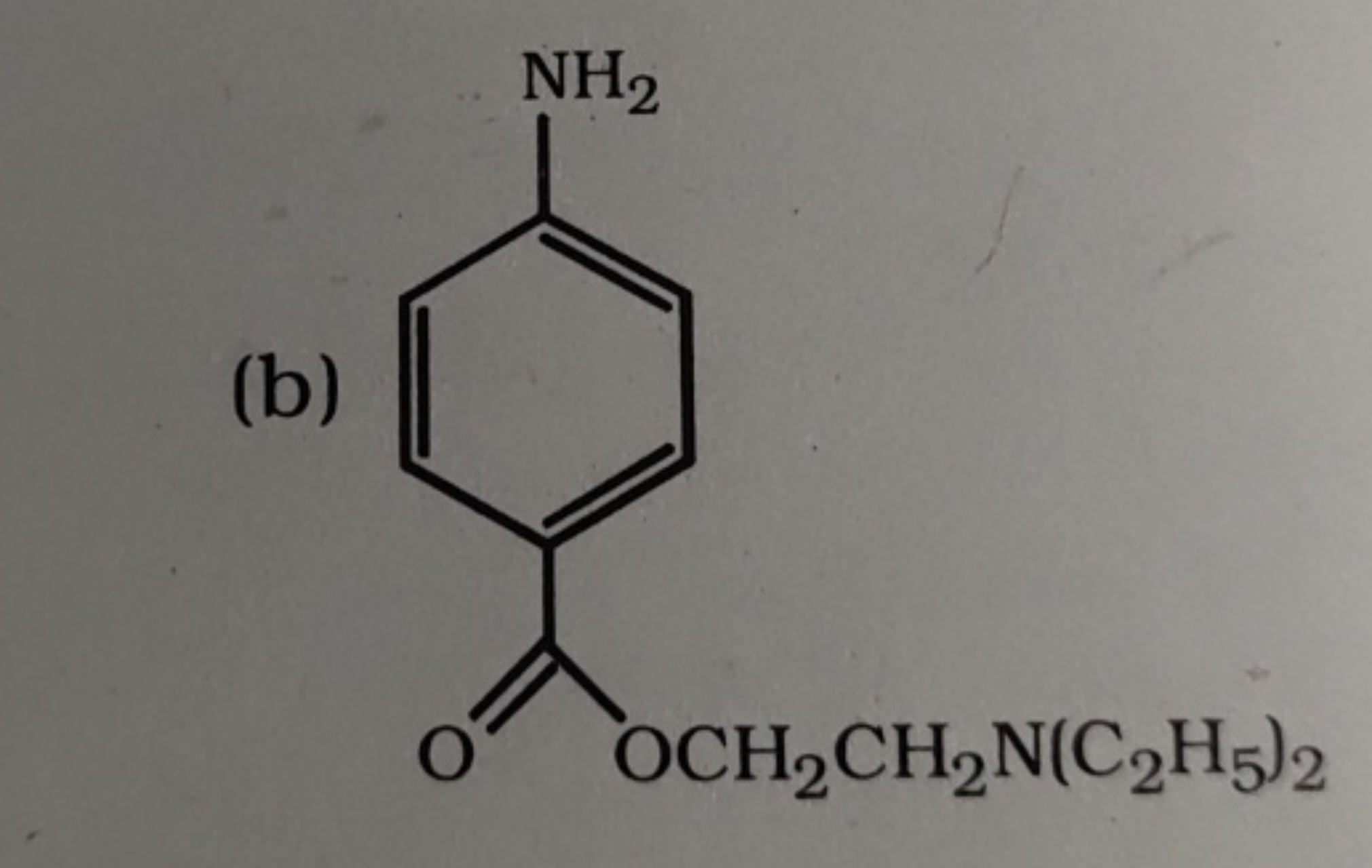 (b)
CCN(CC)CCOC(=O)c1ccc(N)cc1