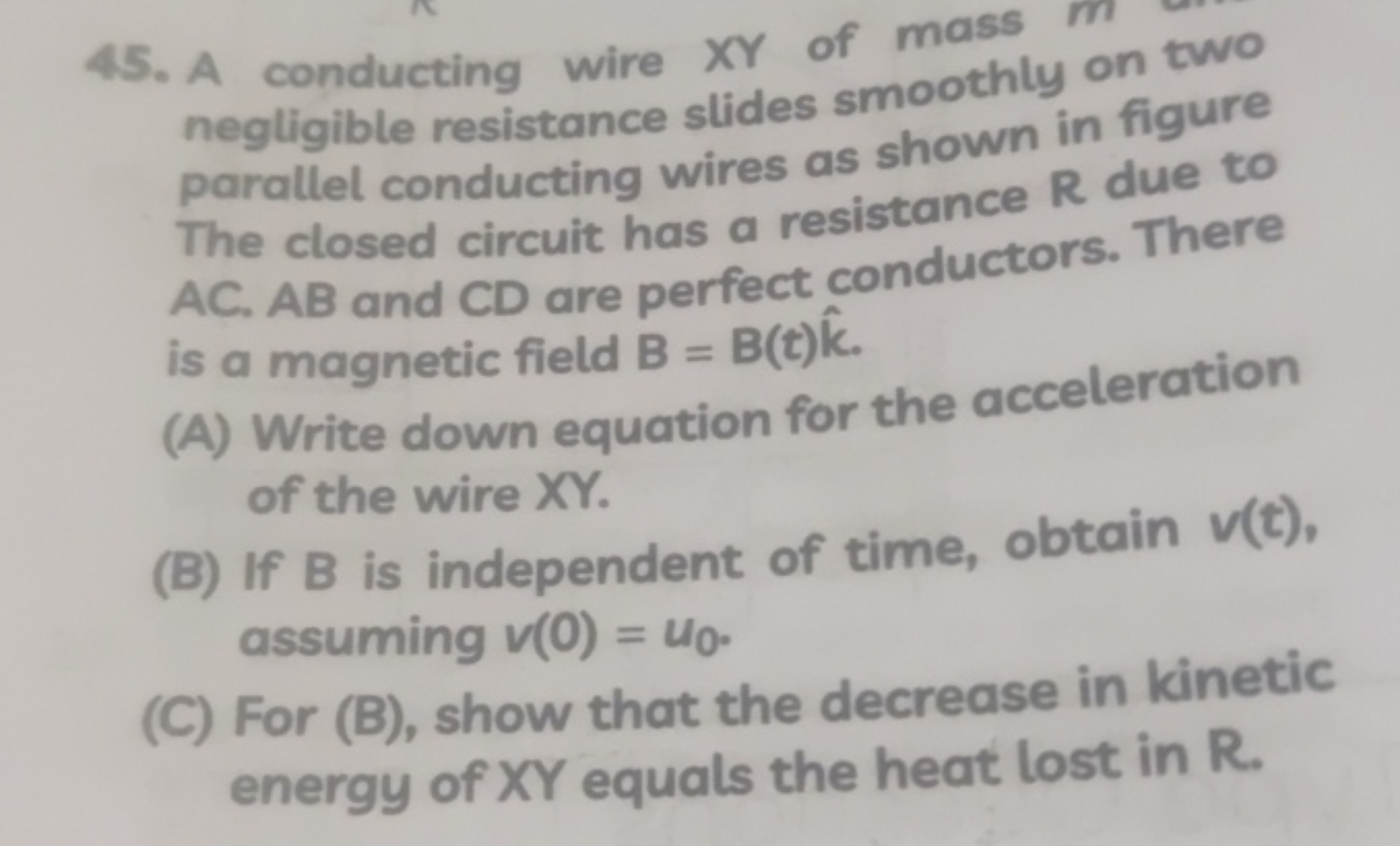 45. A conducting wire XY of mass m negligible resistance stides smooth