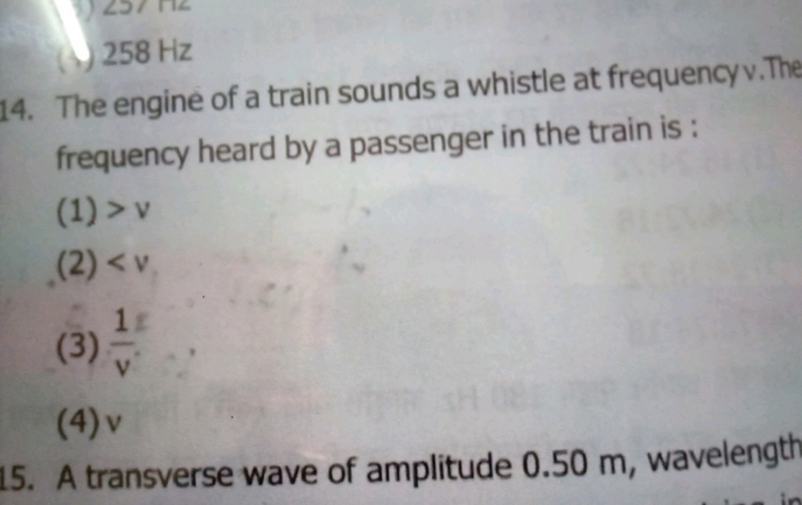14. The engine of a train sounds a whistle at frequency v. The frequen