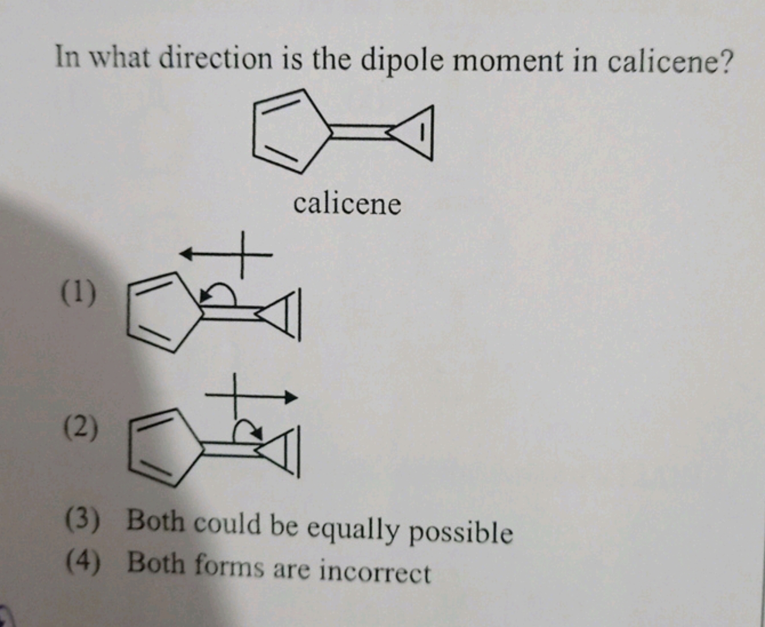 In what direction is the dipole moment in calicene?