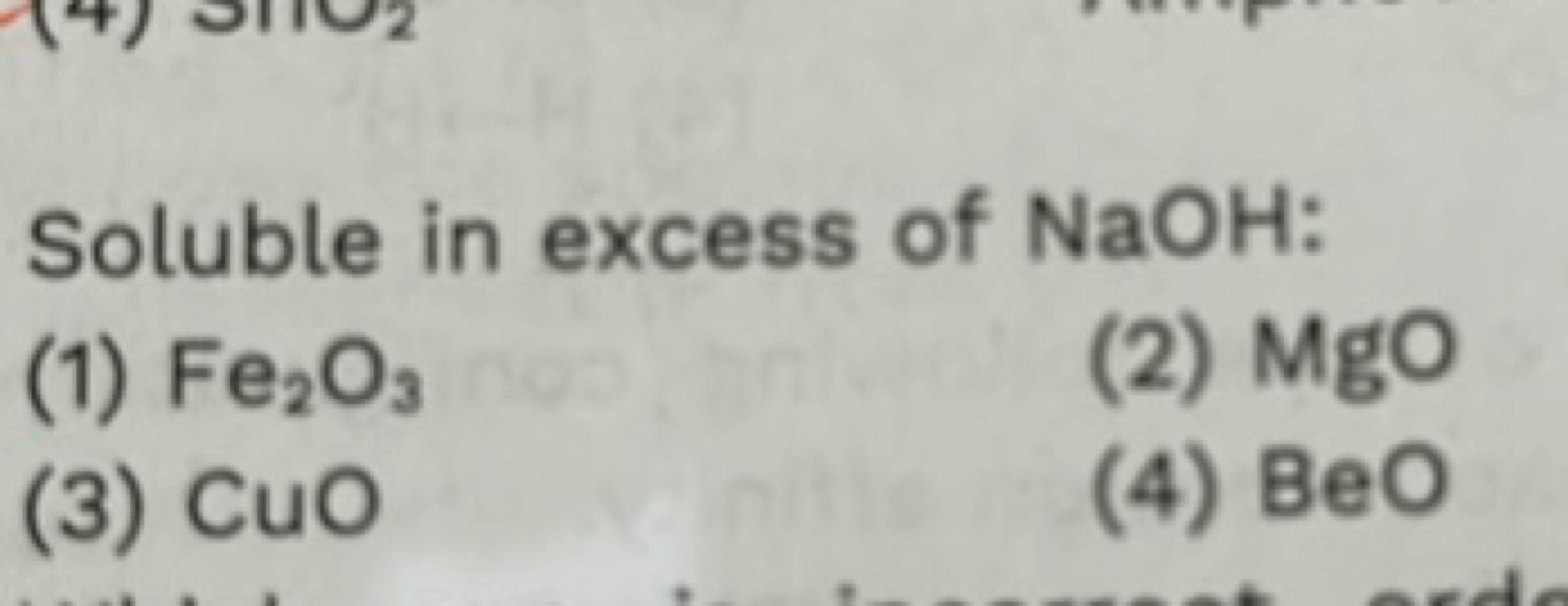 Soluble in excess of NaOH :