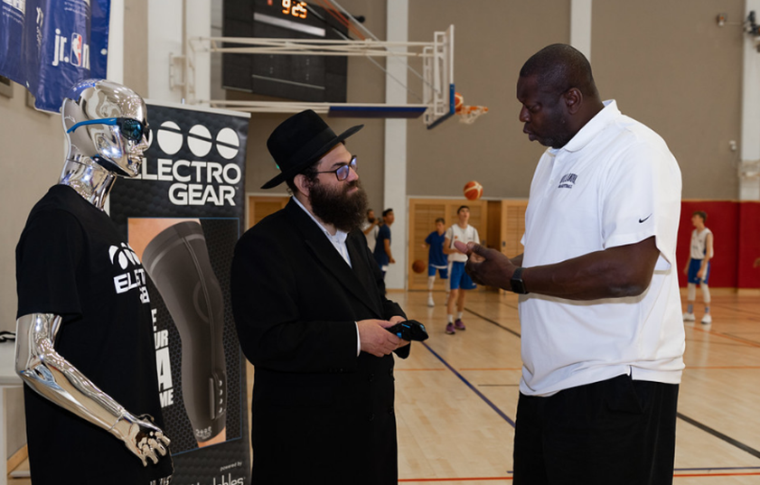 Moshe Lebowitz with NBA Coach and Player Ed Pinckney logo