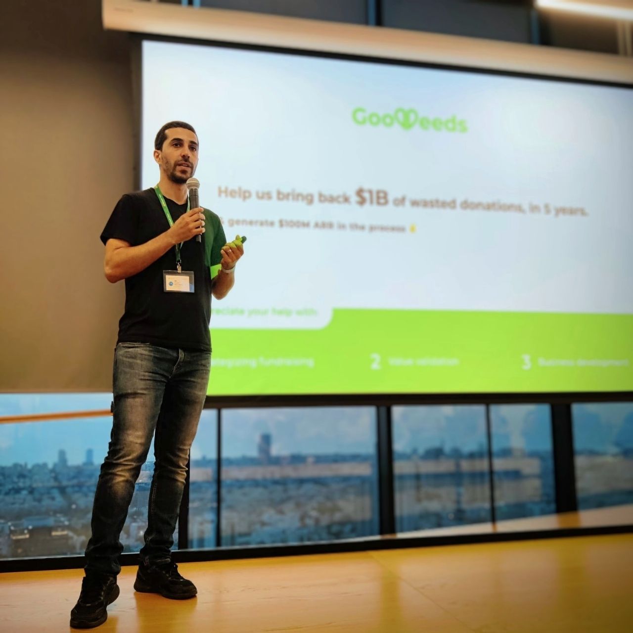 Co-Founder & CEO Hasan Abo-Shally presenting GoodDeeds at the mentoring event of Microsoft's AI for Good accelerator. logo