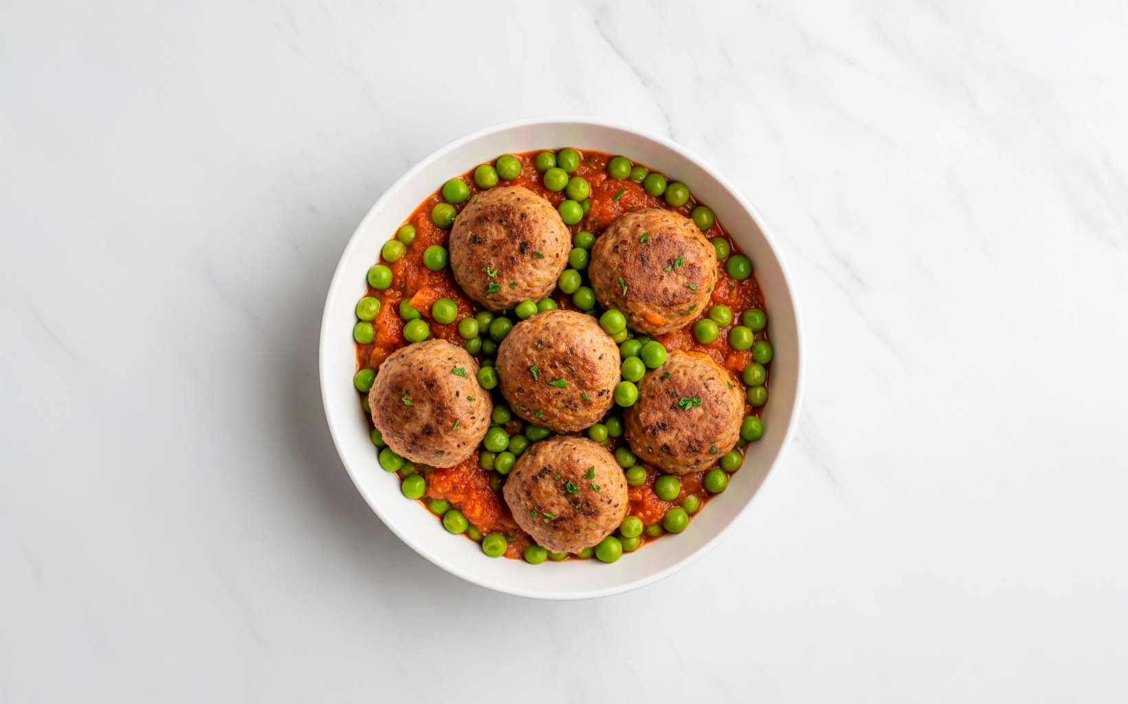 Albóndigas de Cerdo con Guisantes