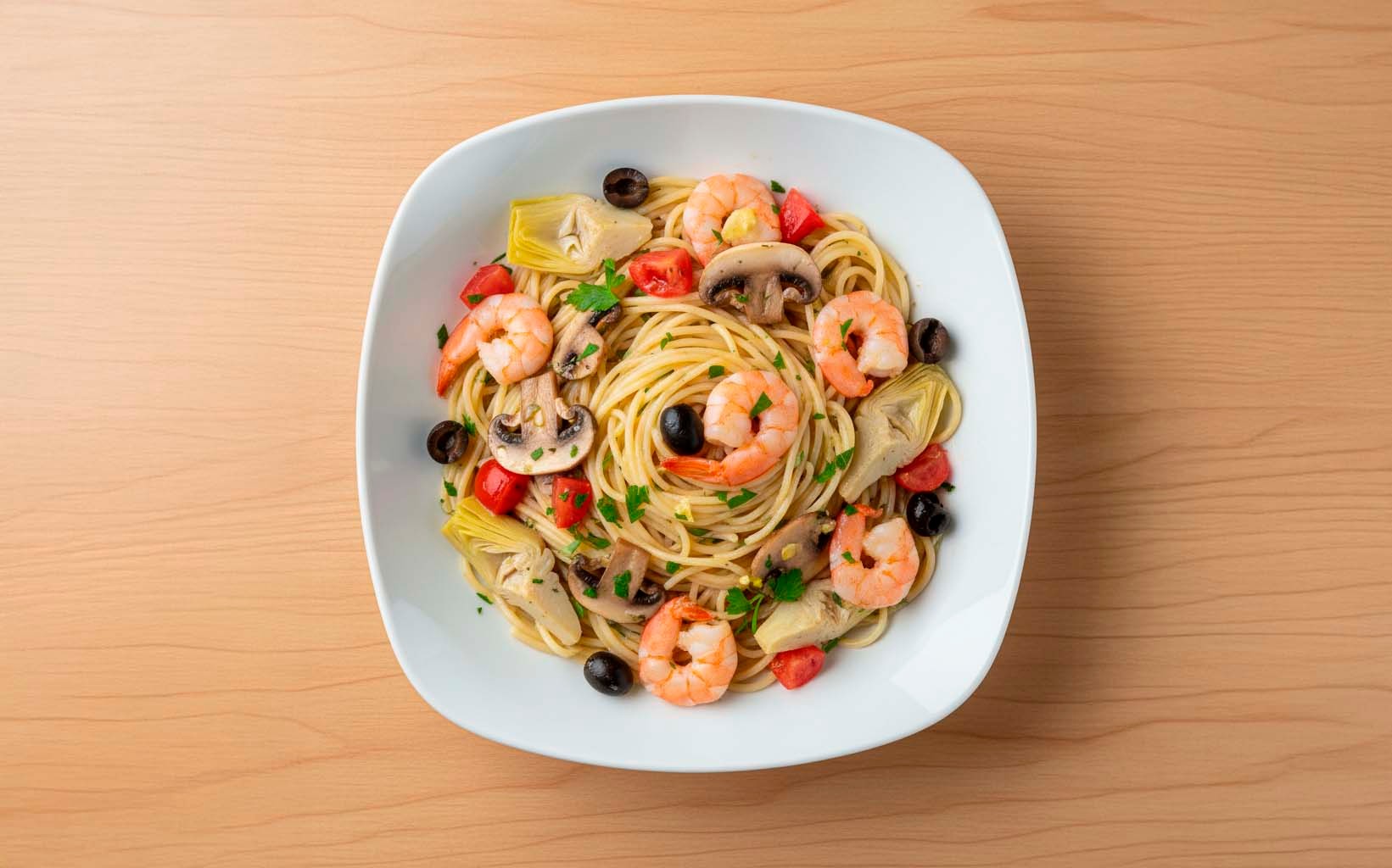 Spaghetti con Camarones y Alcachofa