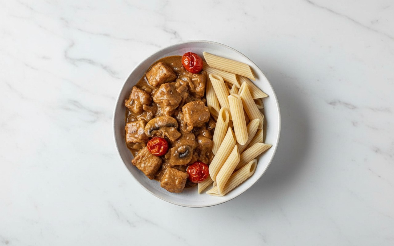 Cerdo en Salsa de Champiñones con Pasta