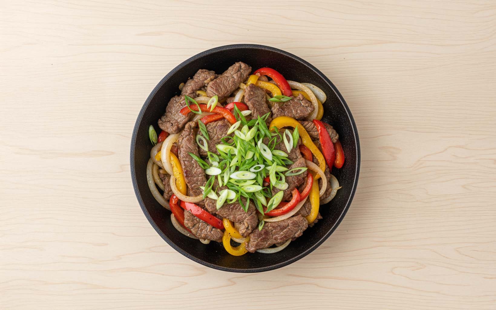 Saltado de Res con Pimiento