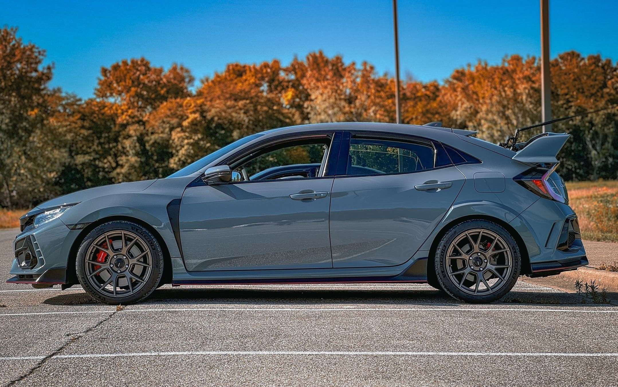 Grey Honda Civic Type R on Konig Ampliform wheels in autumn
