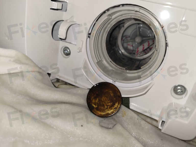 當洗衣機遇上繩子和硬幣：一場意想不到的維修之旅 🧵