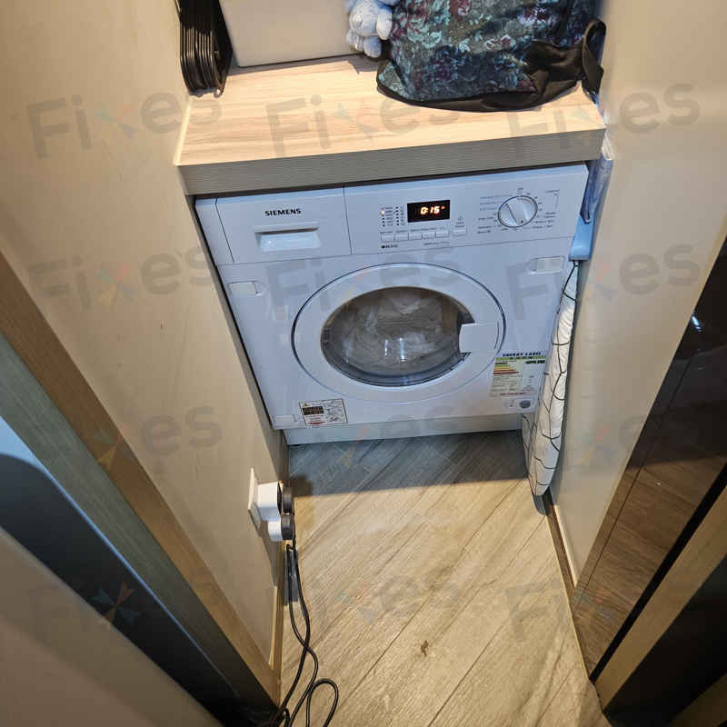 打開排水濾器，這部西門子WK系列洗衣機E06竟藏滿髮夾與雪條棍🔎