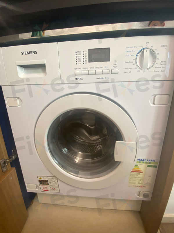 這部西門子WM系列洗衣機E12故障碼一年內再現？師傅拆開碳刷發現驚人真相 🔍