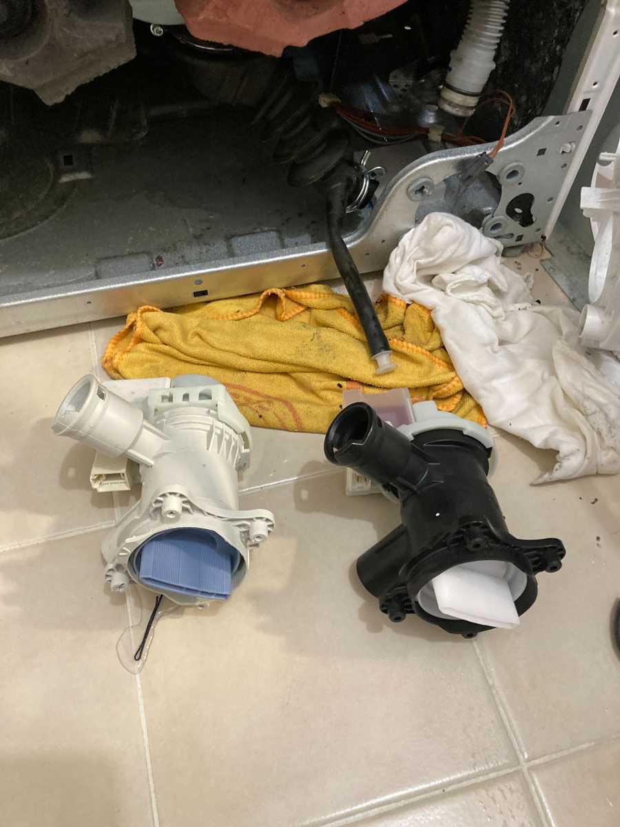排水泵換新卻突遇倒灌:這部西門子WD系列洗衣機E18故障的意外轉折 🌀