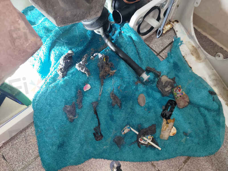 過濾器扭斷後更棘手？這部西門子WN系列洗衣機E18故障碼背後的驚人淤塞物 🪙