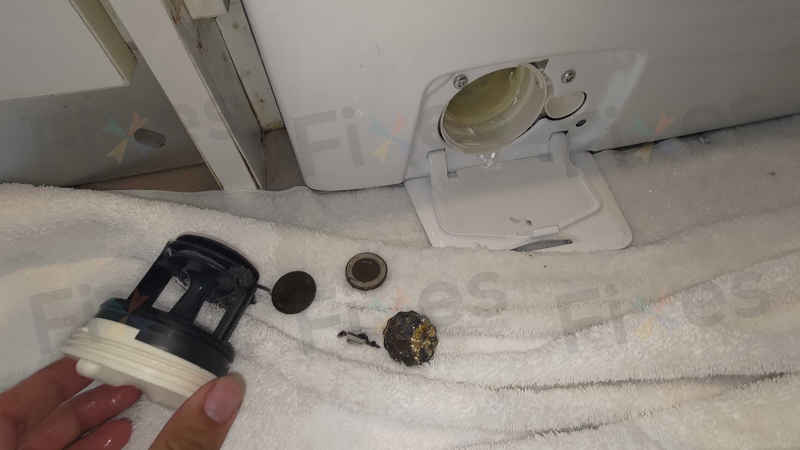 租屋交接最怕這種事:這部Philco PWD系列洗衣機E20故障碼,上一手留下的異物塞爆排水 🧾