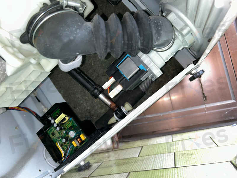 露台洗衣機的隱藏風險：一次E21故障維修的啟示 🌞