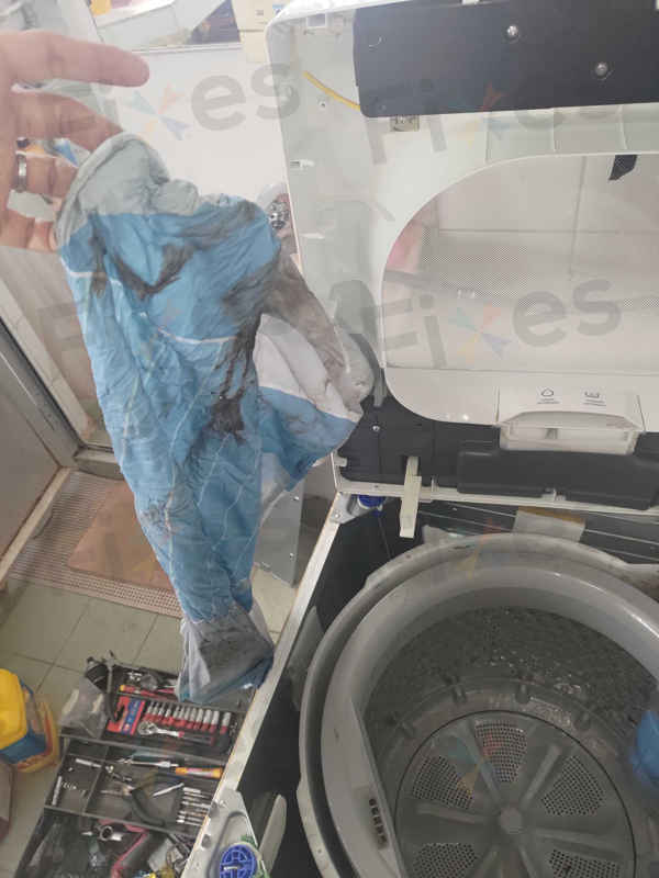 一個枕頭袋令這部Toshiba洗衣機全面罷工？E7-4故障碼的意外真相 🛏️