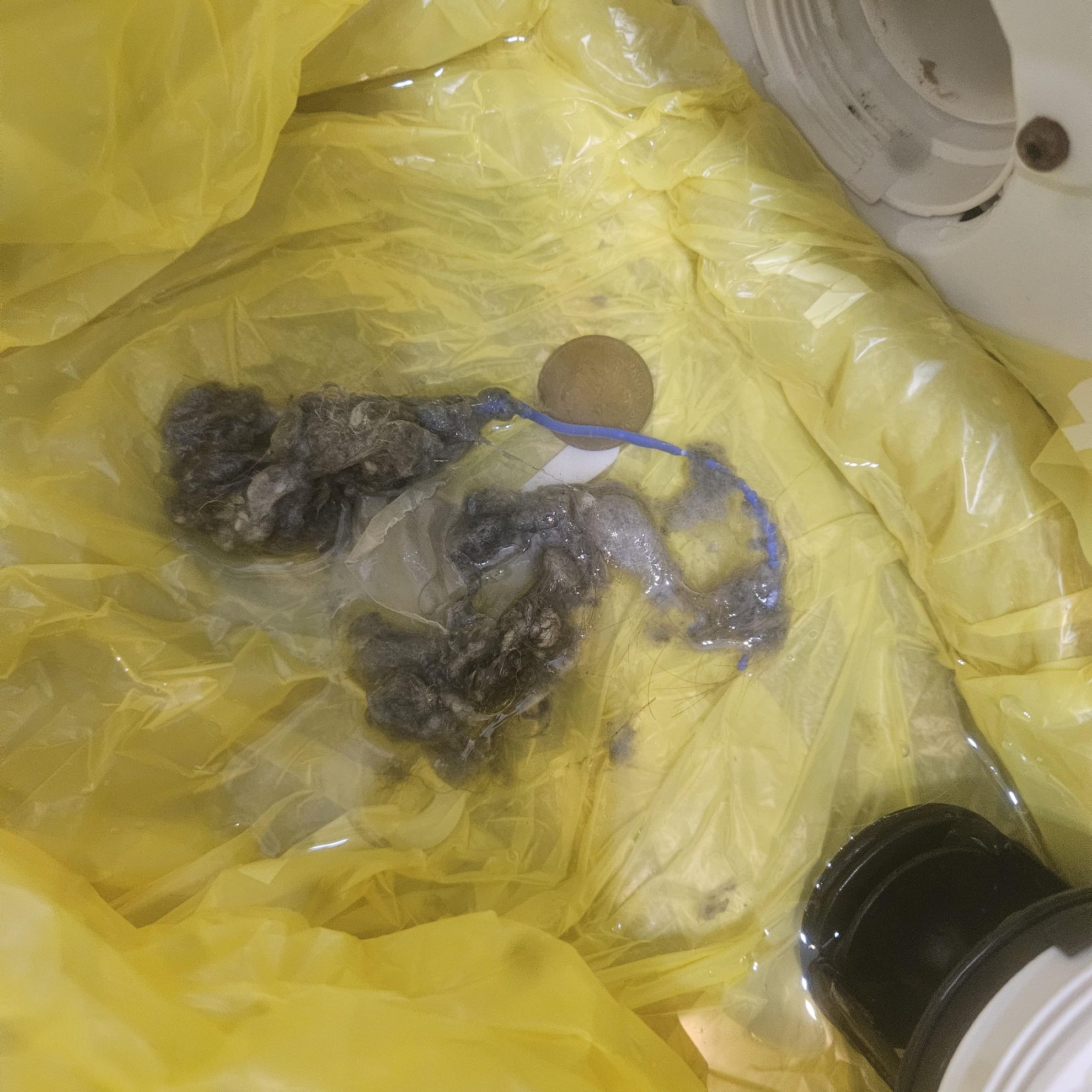 Candy 前置式洗衣機排水時好時壞 — 清出硬幣橡筋後更換老化排水泵